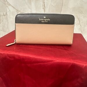 Kate Spade Black and Tan Wallets with Sophisticated Design